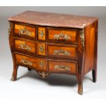 A Louis XV commodeRosewood and jacaranda marquetry workMarble top with applied raised and gilt