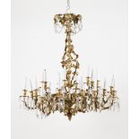 A large chandelierOf 24 branchesRaised, chiselled and gilt structureVine related decorative