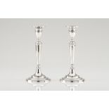 A pair of D. Maria candlesticksPortuguese silver, 18th centuryPlain shaft and stand of beaded