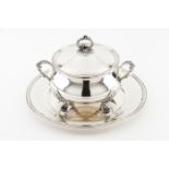 A tureen with cover and trayPortuguese silverPlain body on four stylised foliage shaped fee,