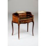 A kidney shaped deskRosewood, jacaranda and other timbers marquetry decorationGilt bronze hardware