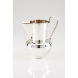 An Art Deco jugPortuguese silverPlain body and spout with volute handleOporto hallmark, Boar for