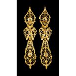 A pair of king style earringsPortuguese goldPierced and scrolled floral decoration, central bow,