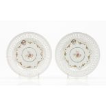 A pair of armorial platesChinese export porcelainOf pierced lip, moulded basketweave and