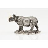 A rhinocerosPortuguese silverRhinoceros sculpture with two bone hornsGreats of Africa