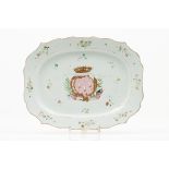 An armorial serving trayChinese export porcelainPolychrome "Famille Rose" enamelled decoration