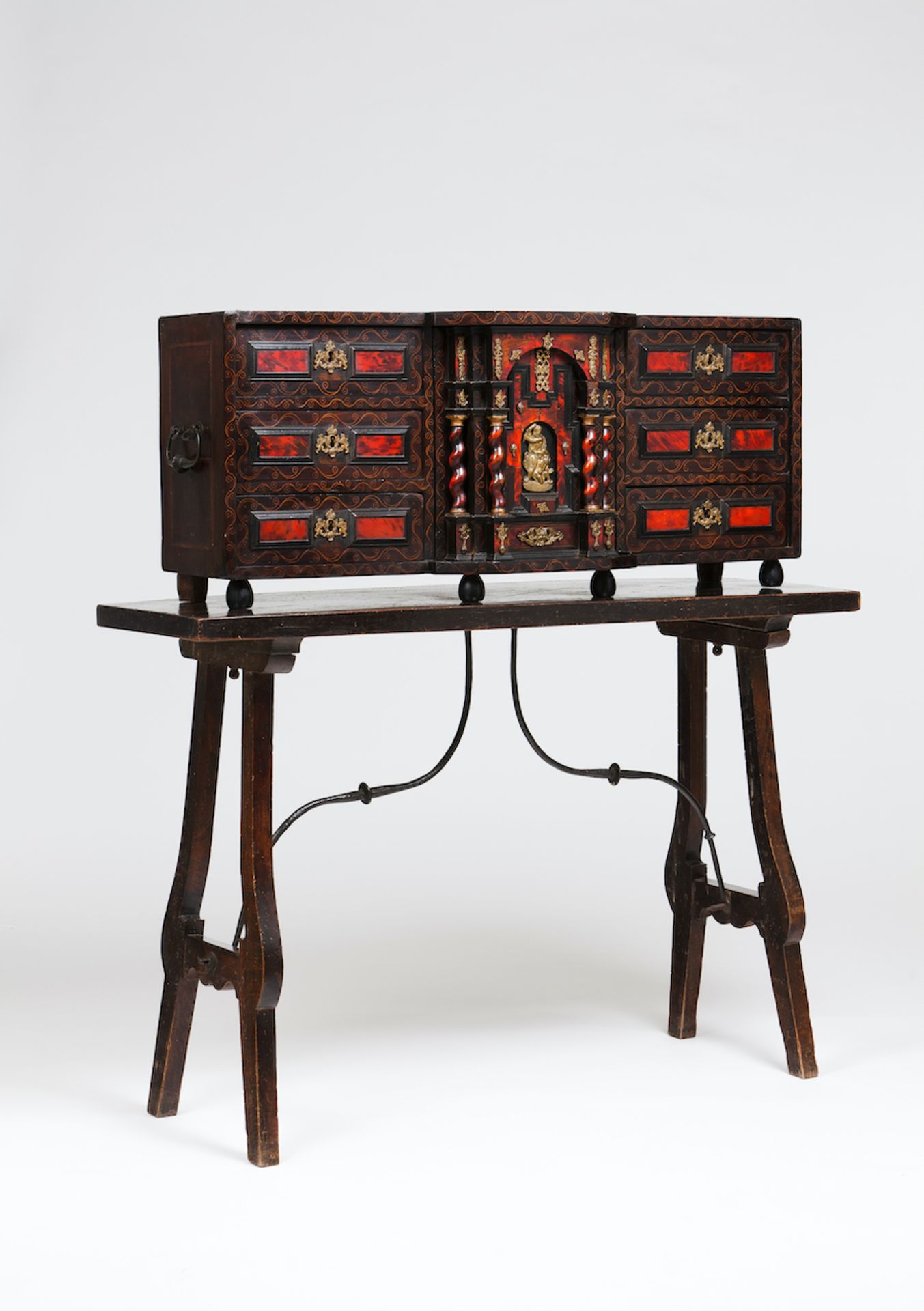 A cabinet on standWalnutSix drawers and central pigeonhole with satinwood and tortoiseshell inlaid