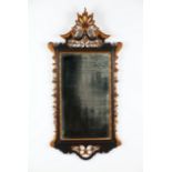 A D.José style wall mirrorCarved, painted and gilt wood with foliage ribbing and central