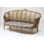 A Louis XVI setteeCarved and painted woodTextile upholsteryFrance, 18th century(losses, faults and