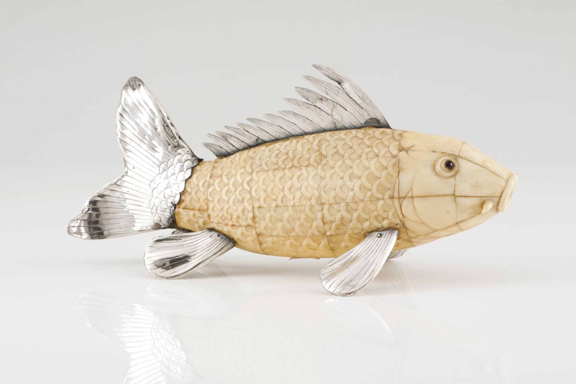 A Luiz Ferreira fishSilver and carved bone plaquesScalloped and chiselled decoration with glass