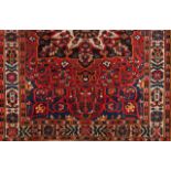 A Bakhtiari carpet, IranCotton and woolFloral decoration in blue, red, beige and yellow(wear signs)