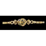 A Romantic period braceletPortuguese gold, 19th centuryArticulated elements of raised and