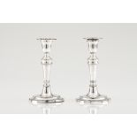 A pair of D. Maria candlesticksPortuguese silverPlain turned shaft of beaded friezesOn a circular