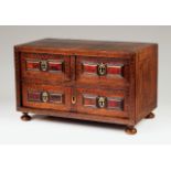 A small Mannerist cabinetSolid and veneered walnut of brass inlaid decorationTortoiseshell coated