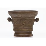 A large mortarRaised bronze with classical masks and flower garlandsInscribed MDCXXXEurope, 17th