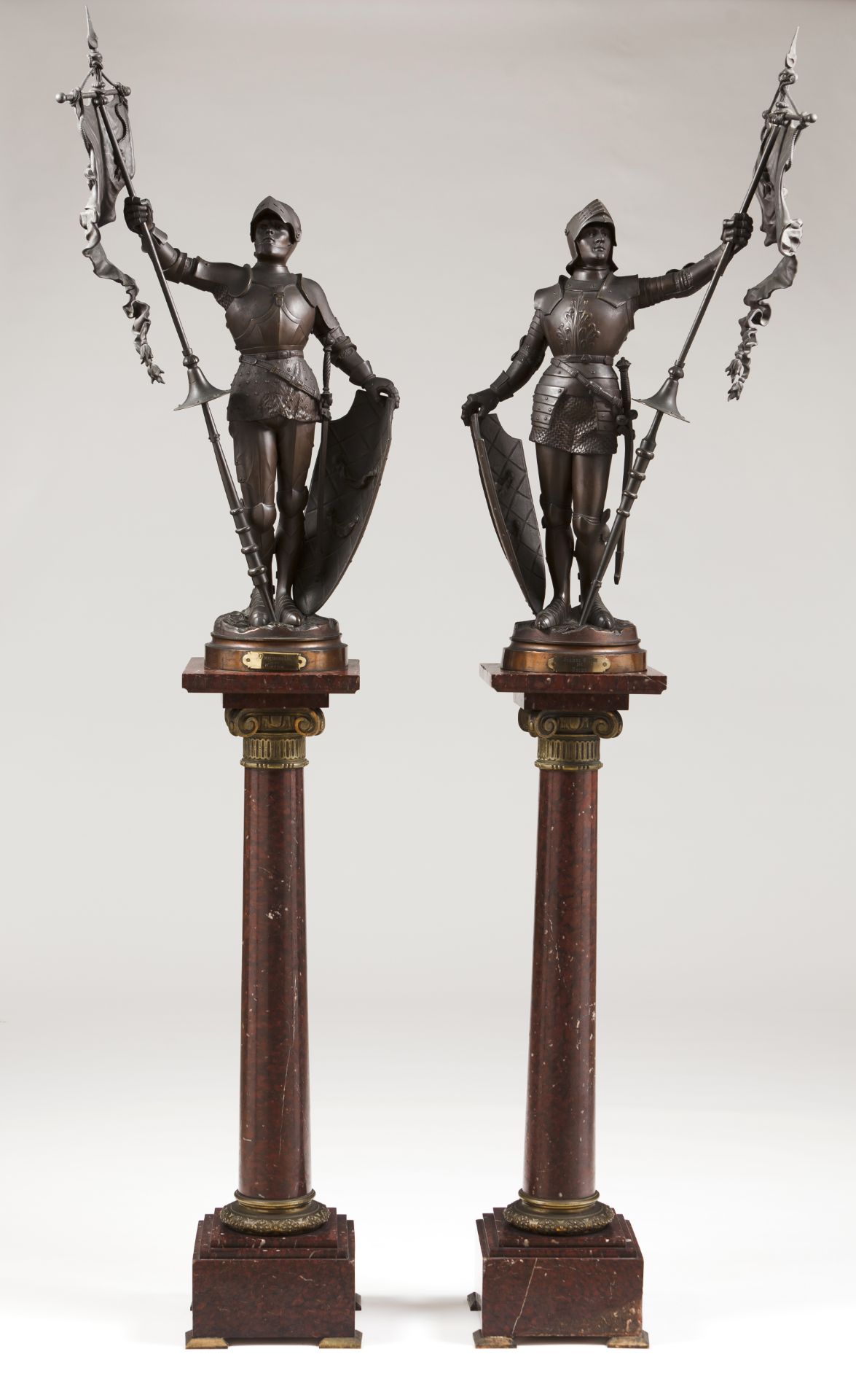 "Bertrand Duguesclin" and "Jeanne D'Arc"A pair of patinated bronze sculpturesSigned "Cornu"Red