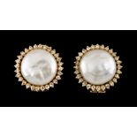 A pair of earringsPortuguese goldMabe pearls encircled by 58 8/8 cut diamondsOporto hallmark, Deer