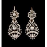 A pair of drop earringsSilver and goldFloral pierced decoration set with various crowned rose