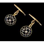 A pair of cufflinksGold and silverCircular shaped of blue enamelled background with silver applied