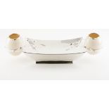 A centrepiece / flower bowlPlain silverModernist designRectangular base with support for two ostrich