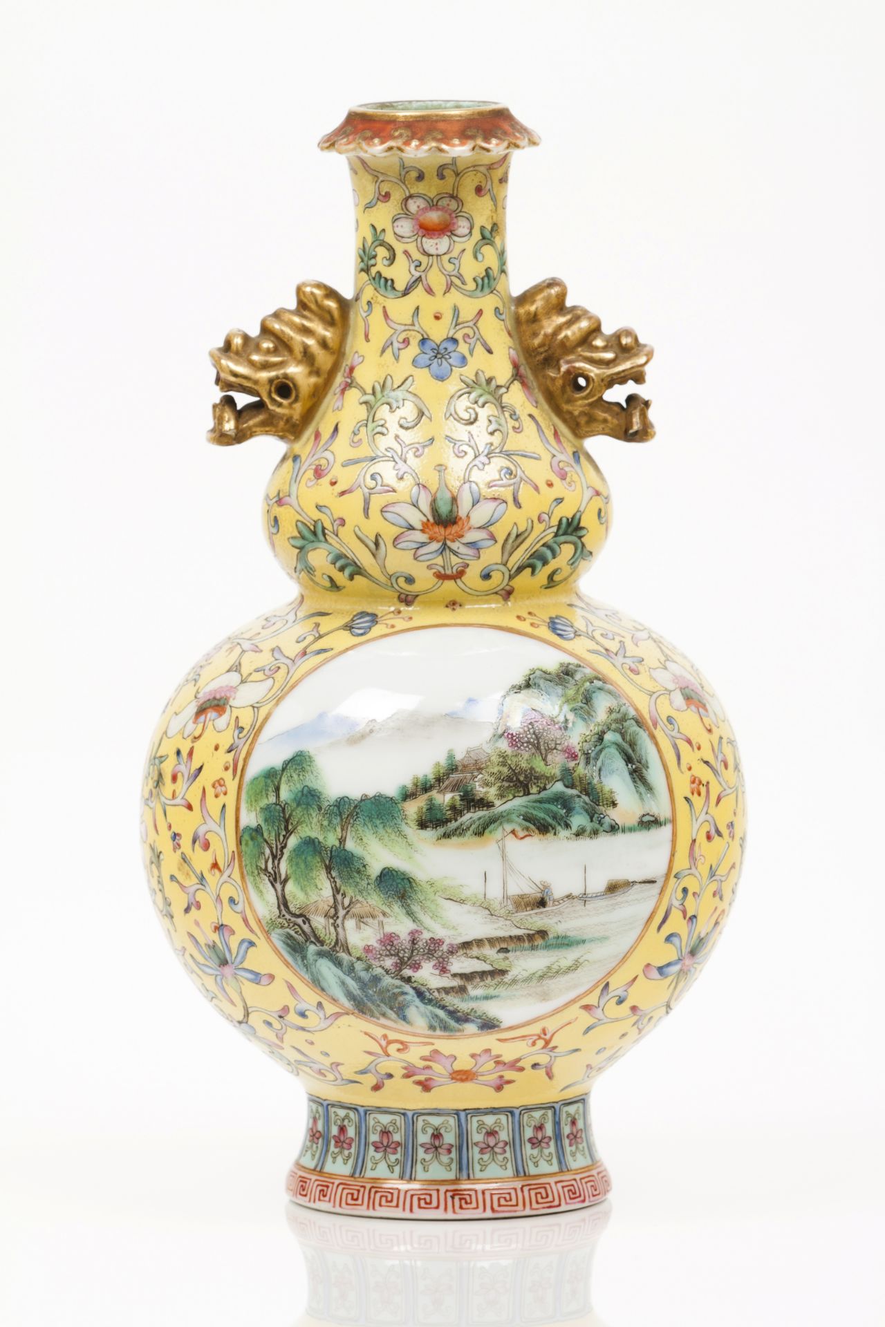 A gourdChinese porcelainPolychrome "Famille Rose" enamelled decoration of floral motifs on a