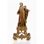 Saint JohnPolychrome and gilt wooden sculptureBaroque wooden stand of exuberantly carved and gilt