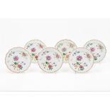 A set of six scalloped platesChinese export porcelainFloral polychrome "Famille Rose" enamelled