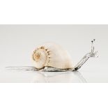 A large Luiz Ferreira snailSilverMoulded and chiselled body set with two garnets and conch