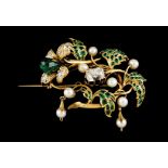 A Romantic period broochGold A stylised flower bouquet set with one rectangular cushion cut