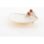 A bowlMother-of-pearl shellApplied silver leaves and hardstone fruitsOn 3 sphere feetLisbon