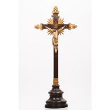 A crucified ChristIvory sculptureTraces of polychromyWood cross with carved and gilt
