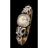 An OmegaBicoloured goldLady's wrist watch of case and part of strap set with 8/8 cut diamondsWorking