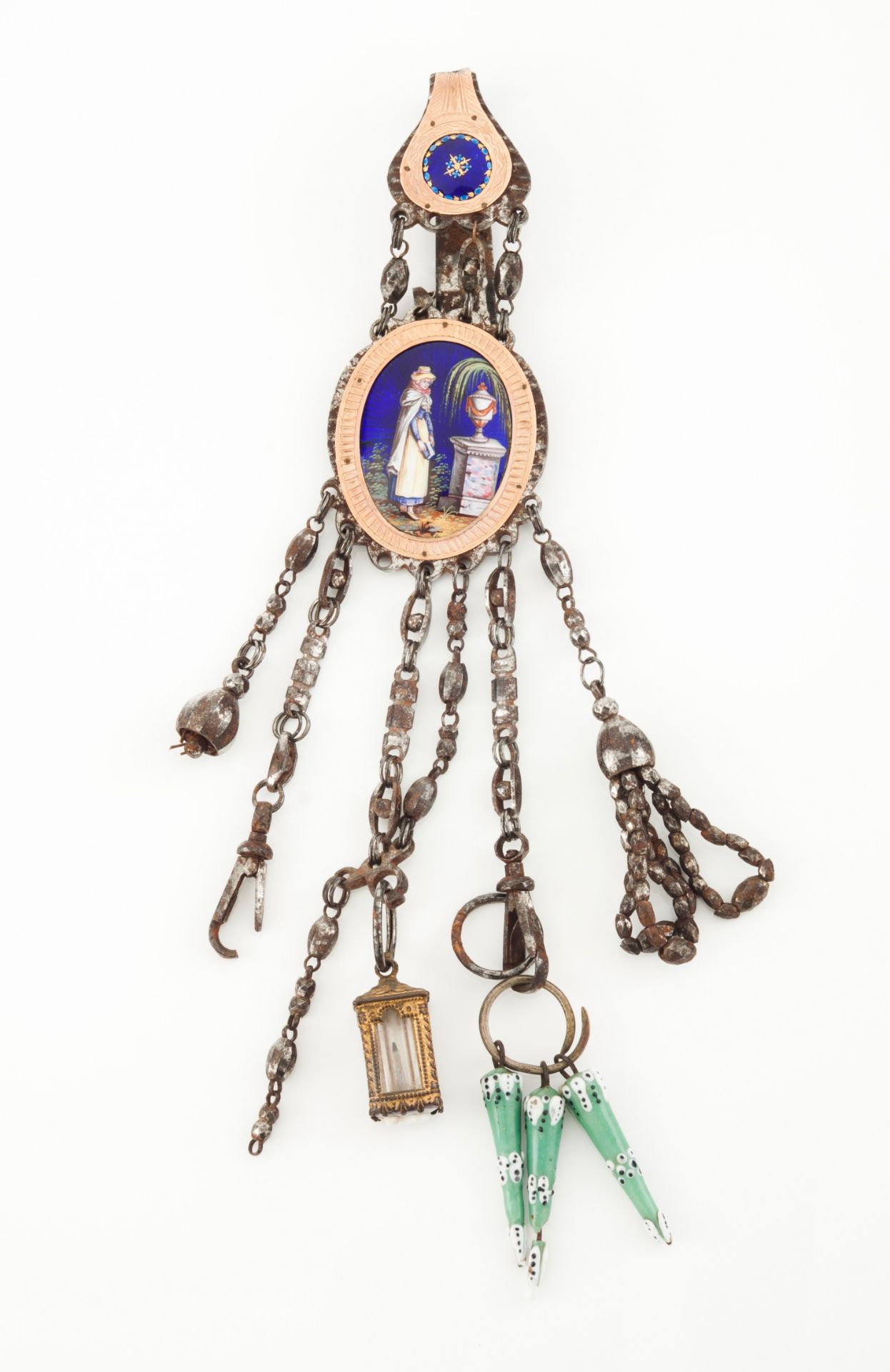 A chatelaineMetalEnamelled medallion depicting a female figure with urn and willowChains with