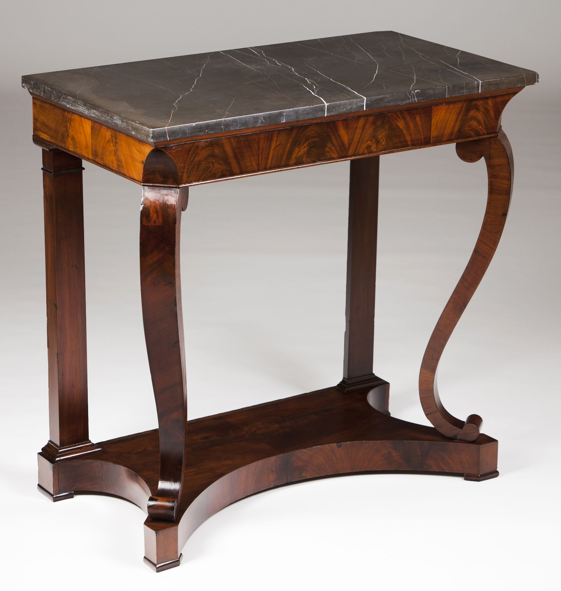 A Louis Phillipe console tableMahogany and burr mahogany veneerMarble topFrance, 19th century(