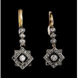A pair of drop earringsSilver and goldFrieze with star drop set with 8 small antique cut diamonds