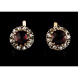 A pair of galleried earringsGoldCentral faux stone framed by 24 antique brilliant cut diamonds