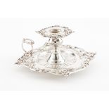 An Art Nouveau chamber stickPortuguese silverRaised and pierced foliage decorationScalloped square
