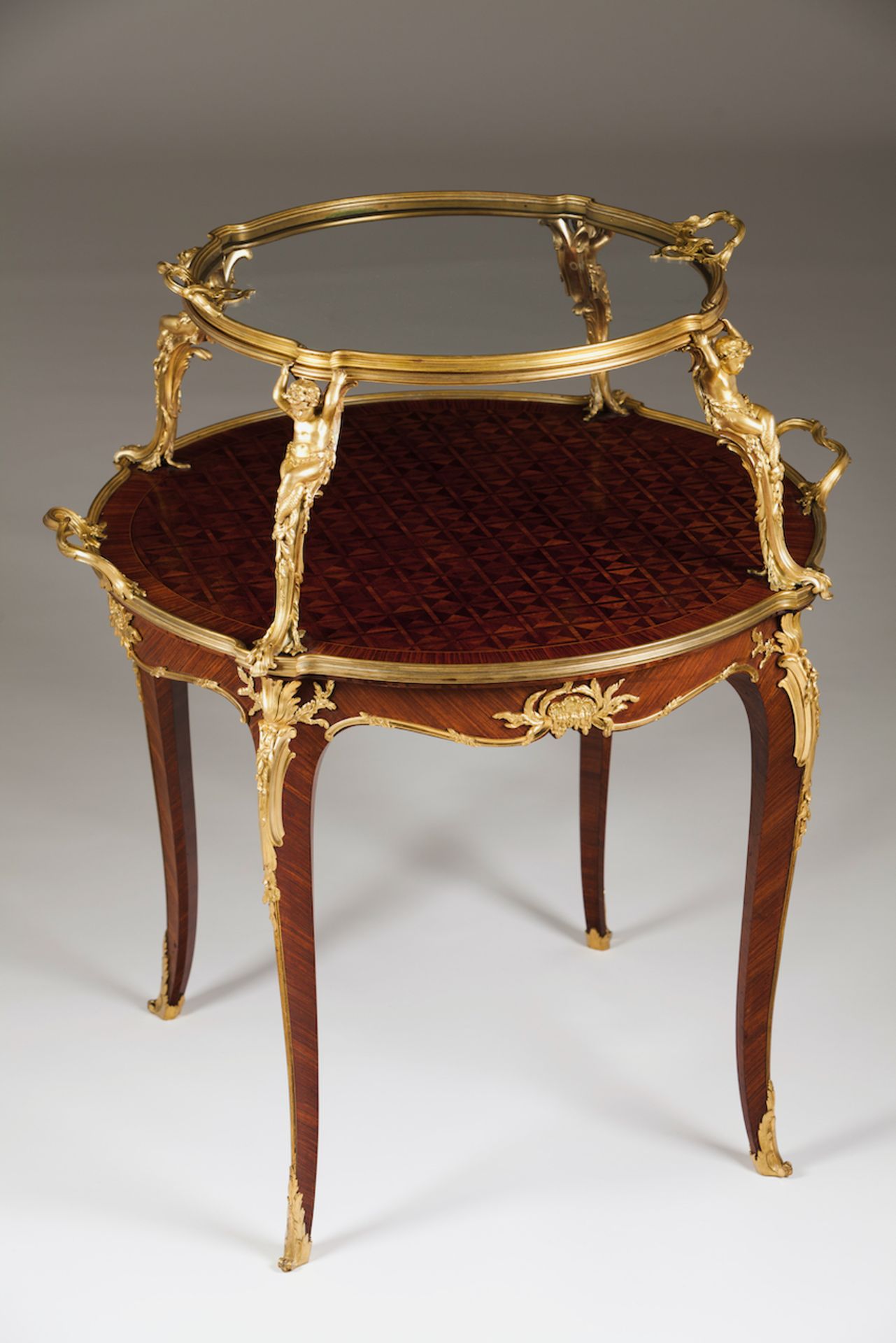 François Linke, Attrib. (1855-1946)Tea table Kingwood veneered Parquetry decoration and gilt.