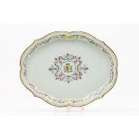 An armorial serving trayChinese export porcelainScalloped lipPolychrome decoration of arabesques and