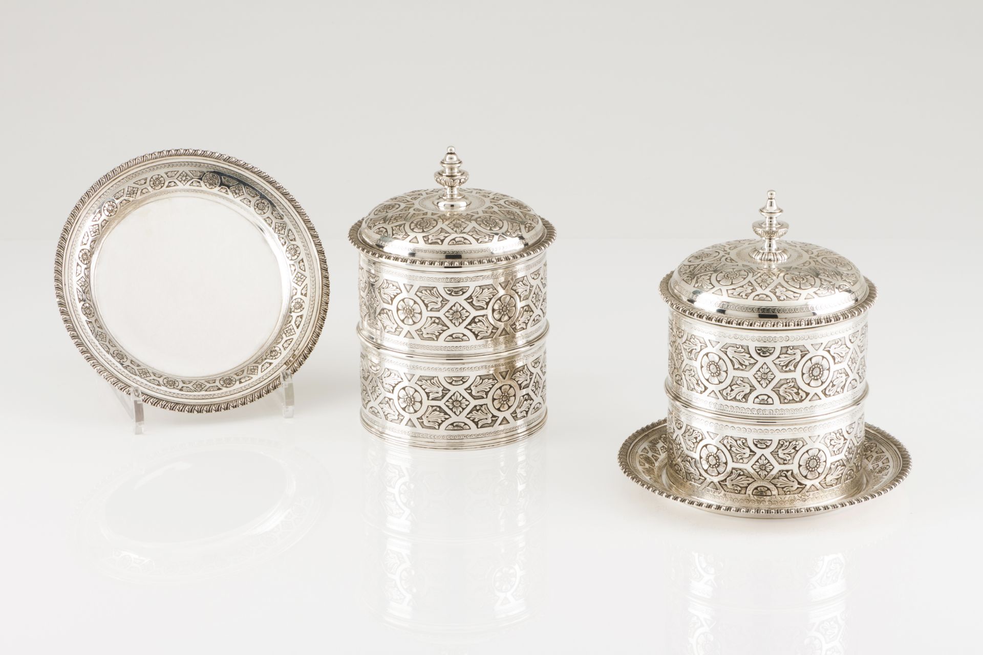 A two biscuit barrel and tray setPortuguese silverCylindrical body of profuse engraved decoration of
