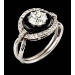A solitary ringGold and onyxSet with one Europa cut diamond (ca.0.96ct) od possible I/J colour and