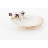A bowlMother-of-pearl shellApplied silver leaves and amethyst fruitsOn 3 sphere feetLisbon hallmark,
