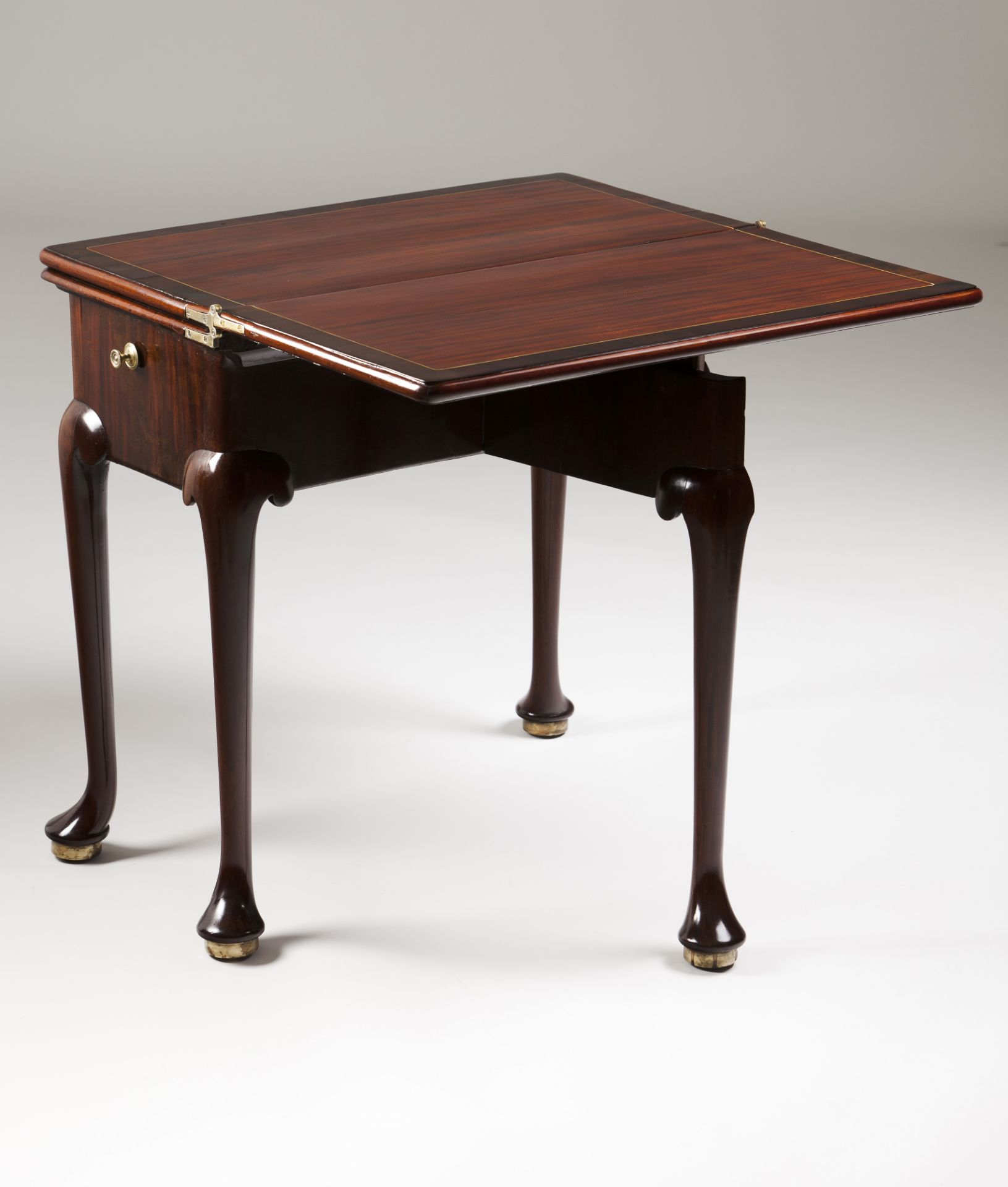 A George II games /writing tableMahogany with satin wood filetsOf two/three tops one green baize