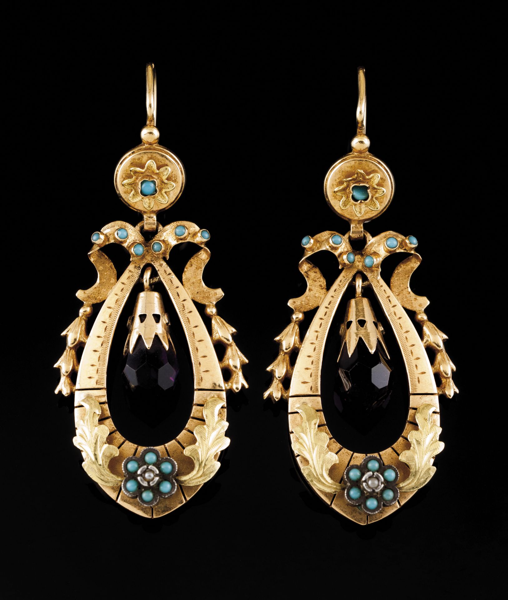 A pair of earringsPortuguese traditional gold and silverChiselled articulated drop of foliage and