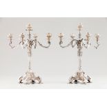 A pair of five branch candelabra