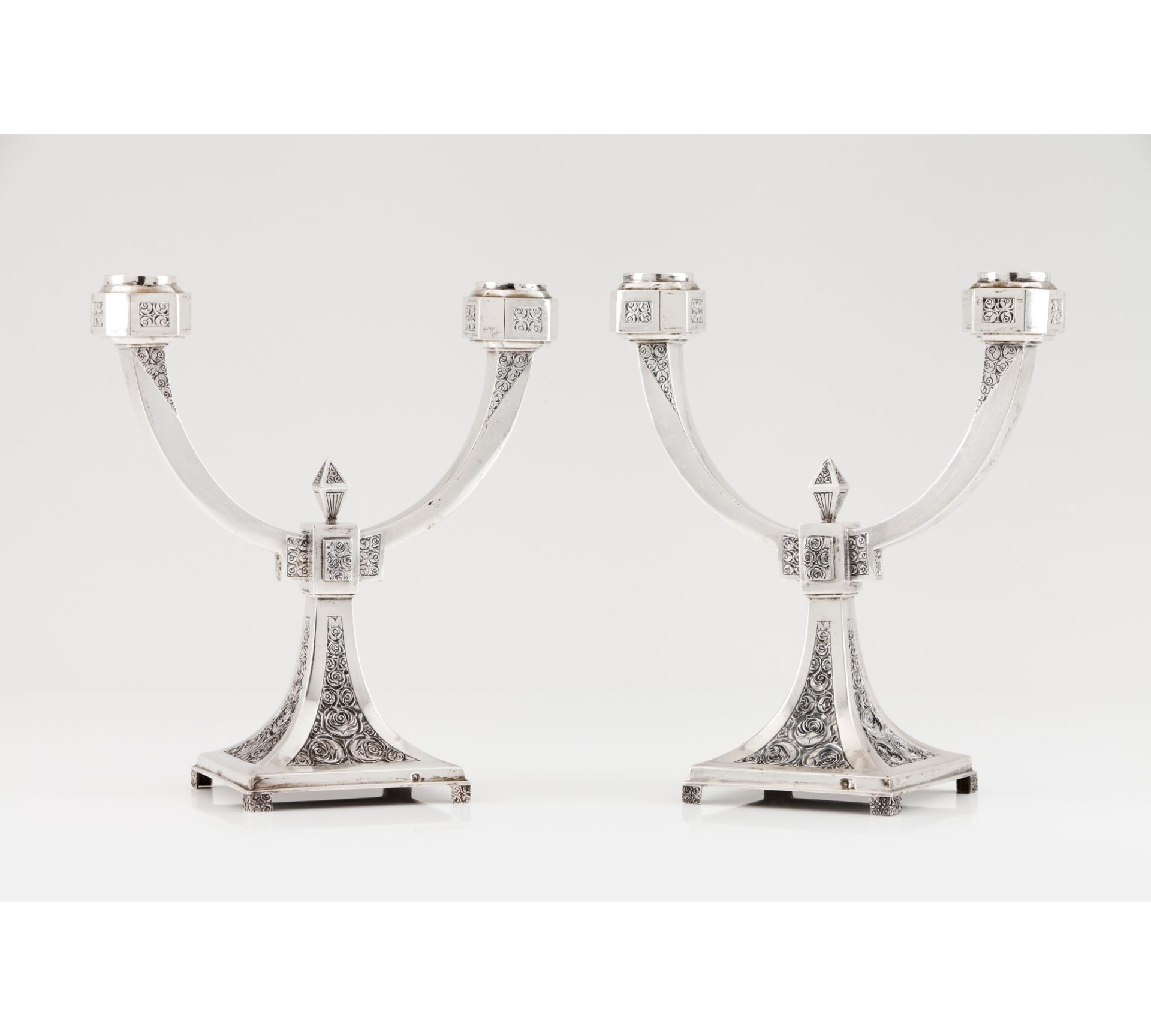 A pair of two branch Art Deco candelabra