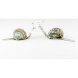 A pair of Luiz Ferreira snail sculptures