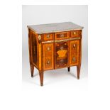 A small neoclassical chest of drawers