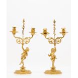 A pair of Napoleon III two branch candelabra