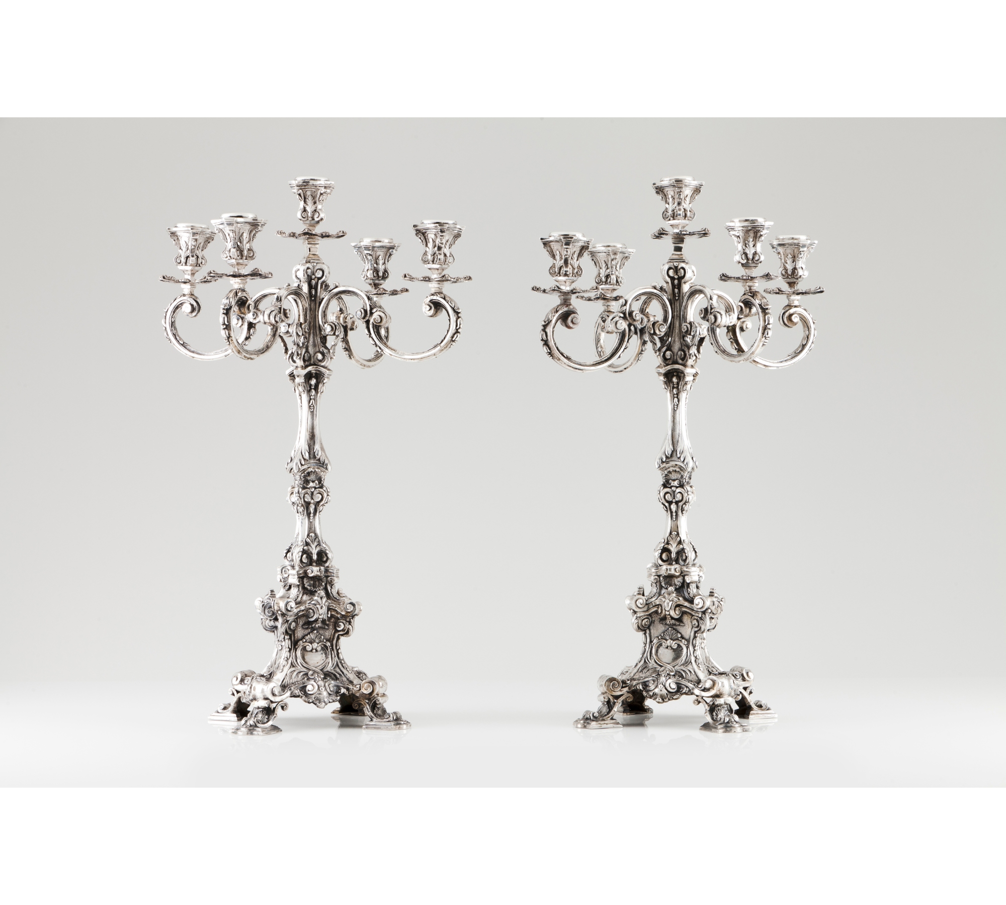 A pair of large five branch candelabra